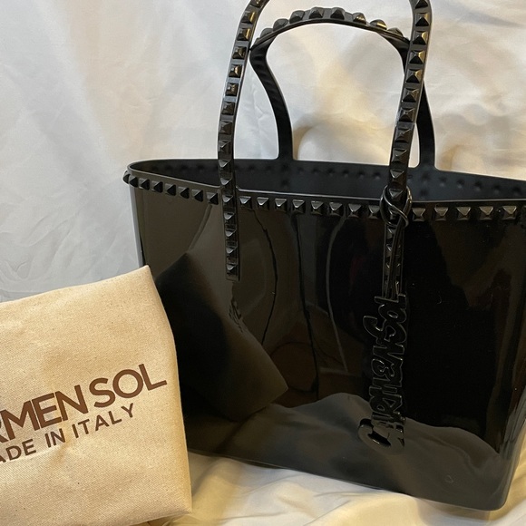 carmen sol Handbags - Carmen’s Sol black purse. Med size. Still smell of their scent of roses.